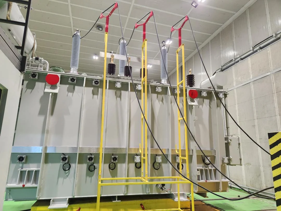 High-capacity power transformer with bushing insulators in warehouse